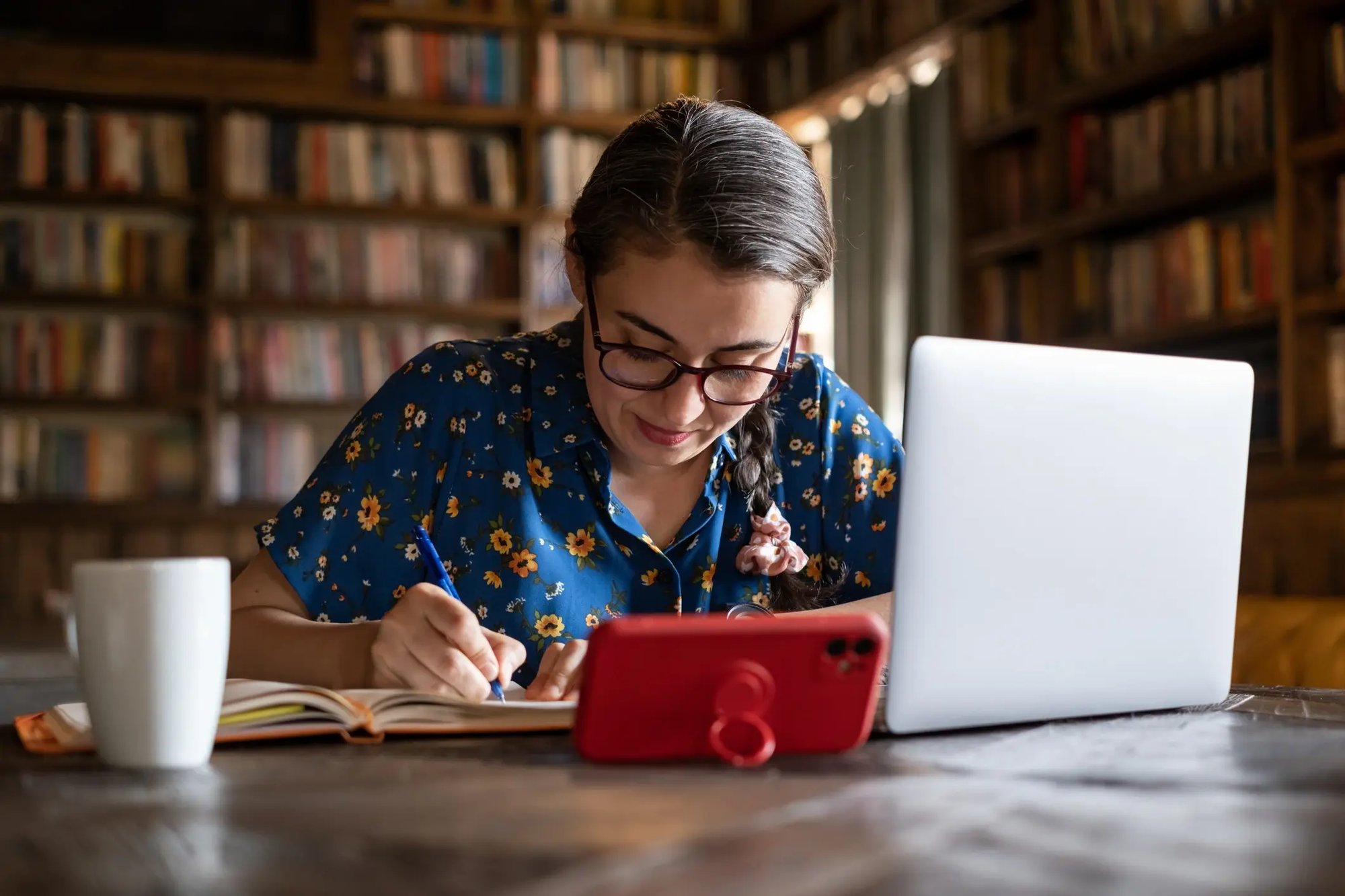 adult student hard at work on her laptop