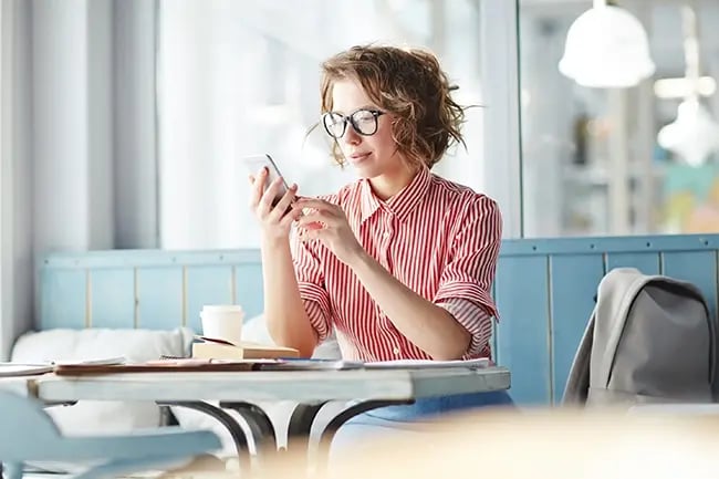 a woman using her phone 